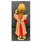 Adorable Norwegian Girl with a Cookie Figurine