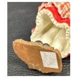 Adorable Norwegian Girl with a Cookie Figurine