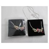 2 July Birthstone Charm Necklaces...