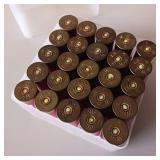 Shotgun shells in a plastic box ***