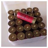 Shotgun shells in a plastic box ***
