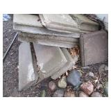 Pile of assorted cinder block paver...