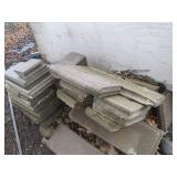 Pile of assorted cinder block paver...