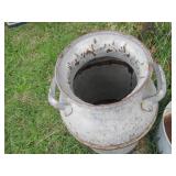 Pair of vintage metal milk cans and...