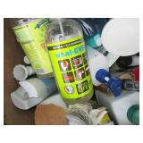 Box of household cleaning supplies ...