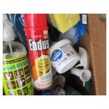 Box of household cleaning supplies ...