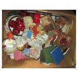 Box of home decor including hand ca...