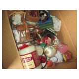 Box of home decor including hand ca...