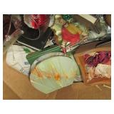 Box of home decor including hand ca...