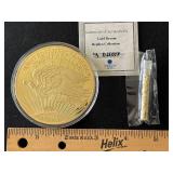 Gold Layered Medallion and Gold Flake Tube