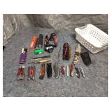 Assortment of Knives and Flashlights