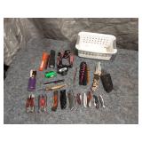 Assortment of Knives and Flashlights