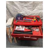 Red Metal Tool Cabinet with Assorted Hand Tools and Ladder