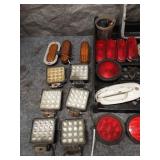 Collection of Vehicle Lights, Grilles, and Assorted Auto Parts