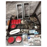 Collection of Vehicle Lights, Grilles, and Assorted Auto Parts