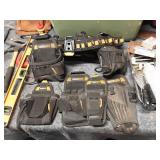 Assorted Construction Tools and Tool Belts Collection