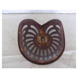 Antique cast-iron tractor seat, Champion brand