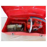 Homelite chainsaw with case Model: XL2 automatic, pulls over