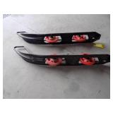 Snowmobile skis with wheels.