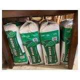 Collection of Garden Supplies Including Peat Moss and Earth Science Sulfur