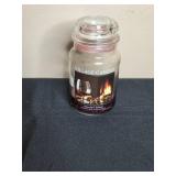 Collection of Decorative Hurricane Vase, Village Candle, and Jesse Ventura Action Figure