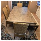 Wooden Dining Table with Woven Chairs and Padded Bench