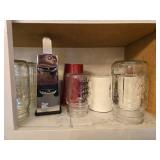 Collection of Empty Glass Jars and Assorted Drinkware