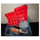 Collection of Kitchenware including Silicone Molds and Storage Containers