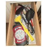 Collection of Kitchen Utensils Including Grater and Spoon