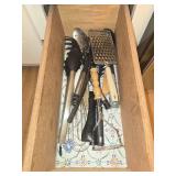 Collection of Kitchen Utensils Including Grater and Spoon