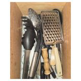 Collection of Kitchen Utensils Including Grater and Spoon