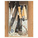 Collection of Kitchen Utensils Including Grater and Spoon