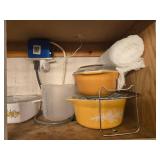 Collection of Kitchenware with Pyrex Measuring Cups and Vintage Casserole Dishes