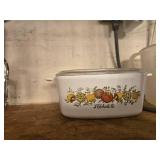 Collection of Kitchenware with Pyrex Measuring Cups and Vintage Casserole Dishes