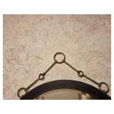 Round Wall Mirror with Black Frame and Metal Hanging Accents