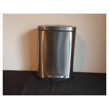 Floral Canvas Wall Art and Stainless Steel Trash Can