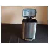 Floral Canvas Wall Art and Stainless Steel Trash Can