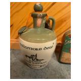 Set of Vintage Whiskey Decanters Featuring Tullamore Dew, Shandon Bells, and Artistic Portrait