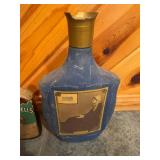 Set of Vintage Whiskey Decanters Featuring Tullamore Dew, Shandon Bells, and Artistic Portrait