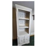 White Wooden Bookshelf with Decorative Back Panel