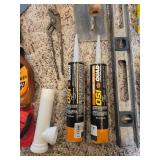 Assorted Home Improvement and Cleaning Supplies with Holiday Stocking