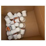 Assorted Household Items Including Organic Honey, Coffee Pods, and Compostable Bags