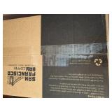 Assorted Household Items Including Organic Honey, Coffee Pods, and Compostable Bags