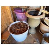 Collection of Gardening Pots and Tools with Decorative Urns