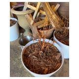 Collection of Gardening Pots and Tools with Decorative Urns