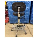 MSRP $1000 High Quality Biofit Regent Height Adjustable Chrome Bench Height Stool Chair With Adjustable Foot Ring - Black - Great Condition - Seat Fabric Has Small Wear Spot In Front! Backed by a 13-y