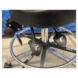 MSRP $1000 High Quality Biofit Regent Height Adjustable Chrome Bench Height Stool Chair With Adjustable Foot Ring - Black - Great Condition - Seat Fabric Has Wear Spot On Back! Backed by a 13-year war