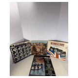 Four Beatle Albums in protective sleeve
