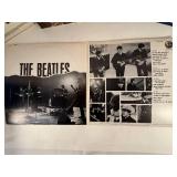 Four Beatle Albums in protective sleeve