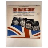 Four Beatle Albums in protective sleeve